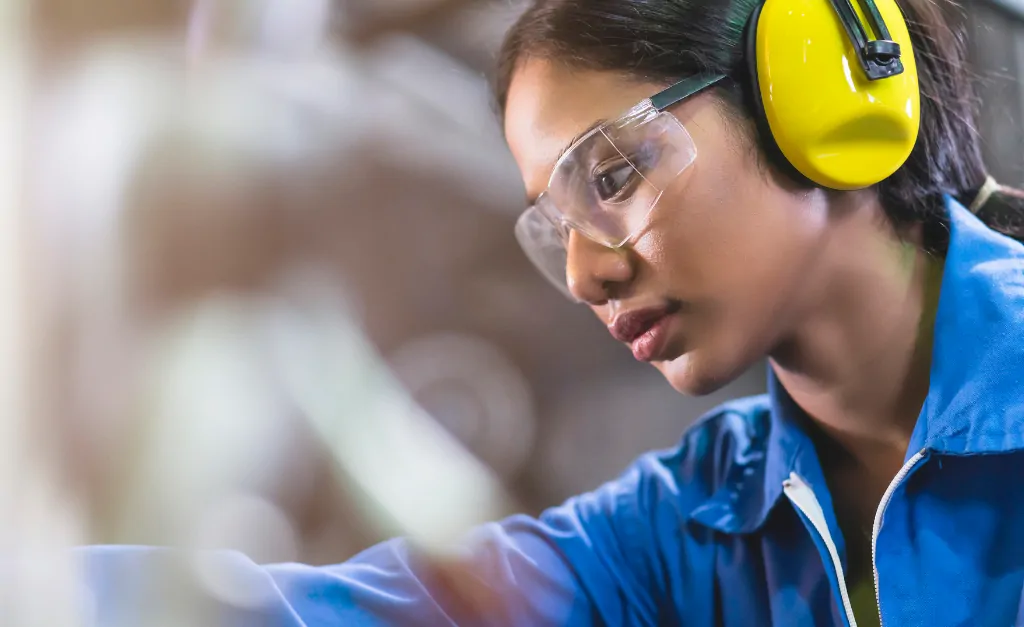 Image of a woman manufacturing.