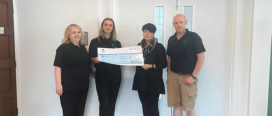 A blog banner image of Pure Staff donating £1,500 to Deafblind UK.